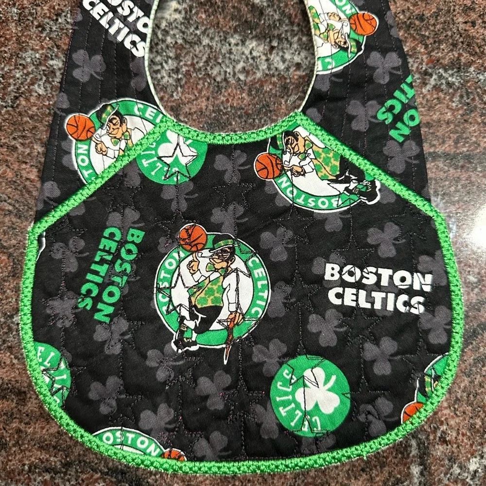 Handmade reversible quilted baby bib in Boston Celtics print